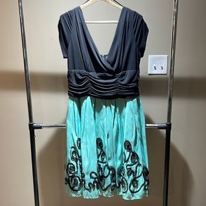 Dressbarn party dress: Black top, mint skirt with black design